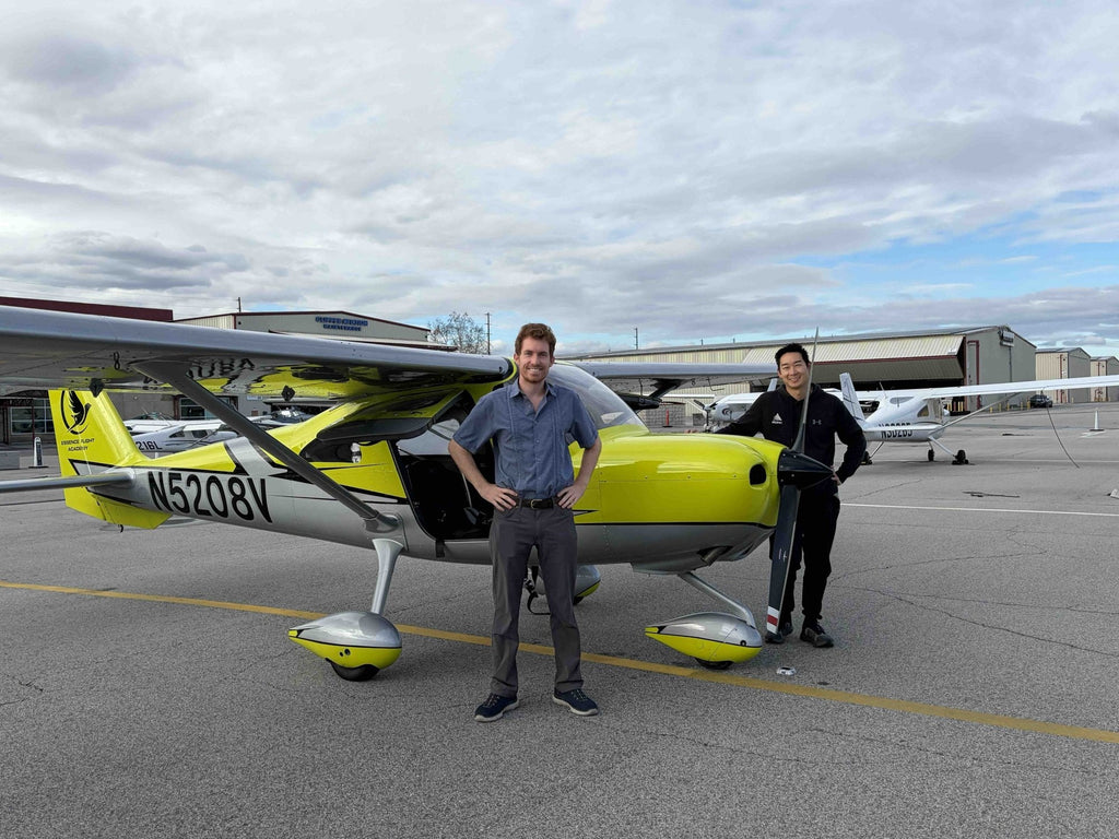 Couple with their instructor at Van Nuys Airport before a two-hour discovery flight for two over Los Angeles