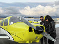 Instructor and student beside a Piper Warrior before a 90-minute discovery flight at Van Nuys Airport, Los Angeles