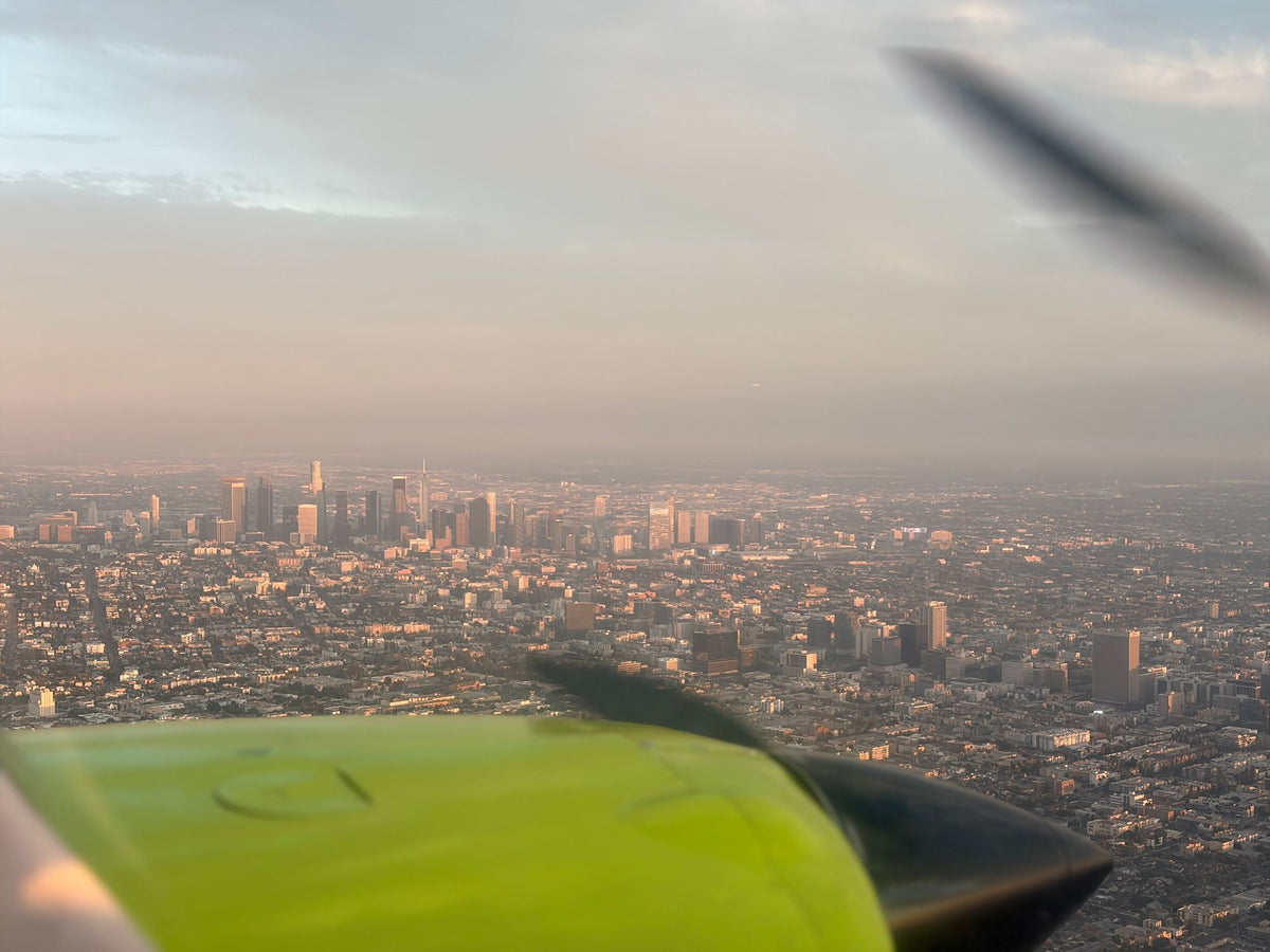 The downtown Los Angeles skyline beyond the Seminole engine nacelle