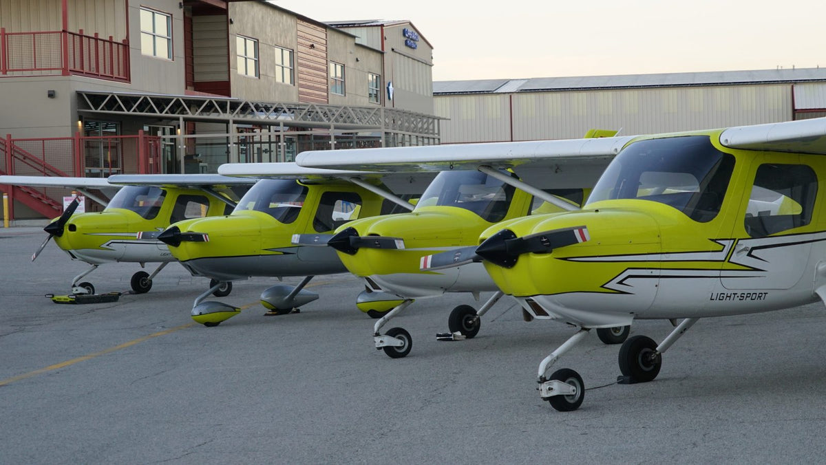 Four Cessna 162 Skycatchers parked in a row