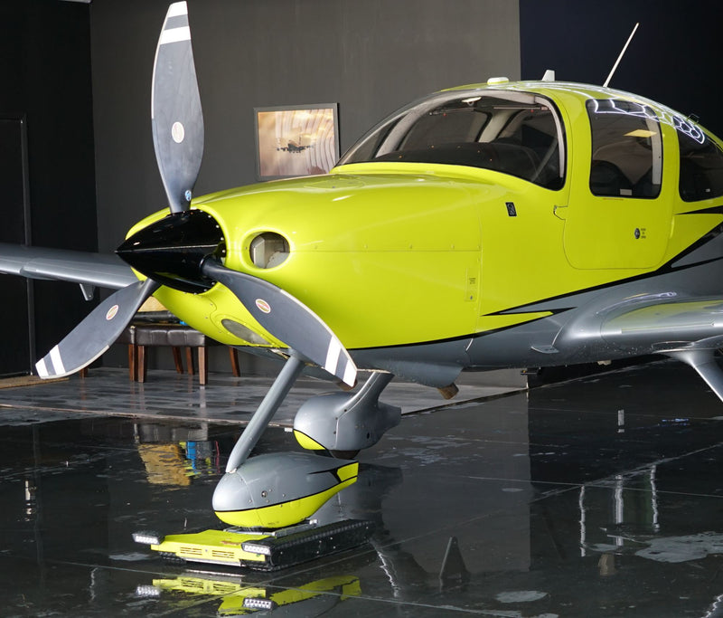 Cirrus SR22 Turbo, left front quarter, in the hangar