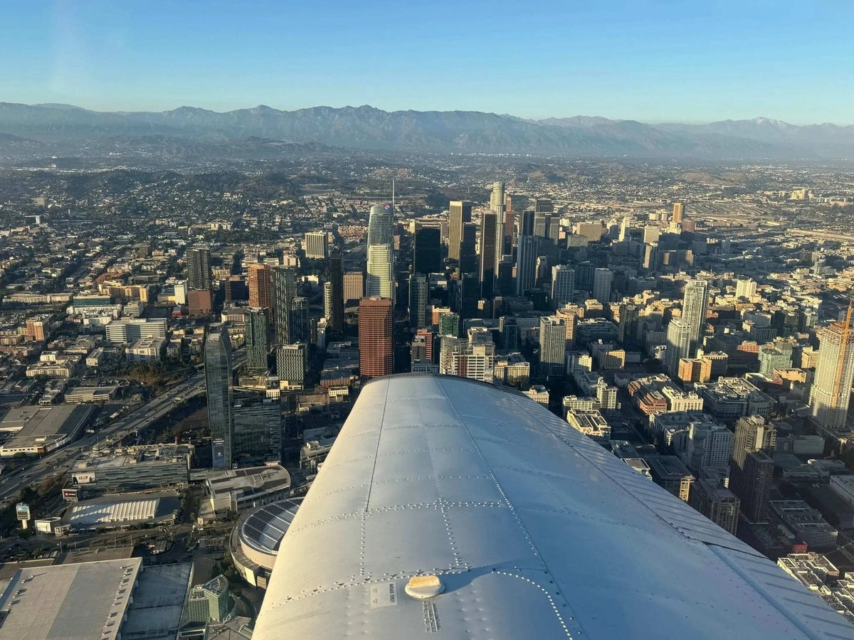 The Los Angeles basin seen from the wing of a training airplane above the Valley