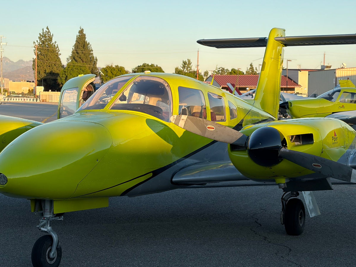 Piper Seminole twin-engine trainer N311EF at sunset at Van Nuys Airport