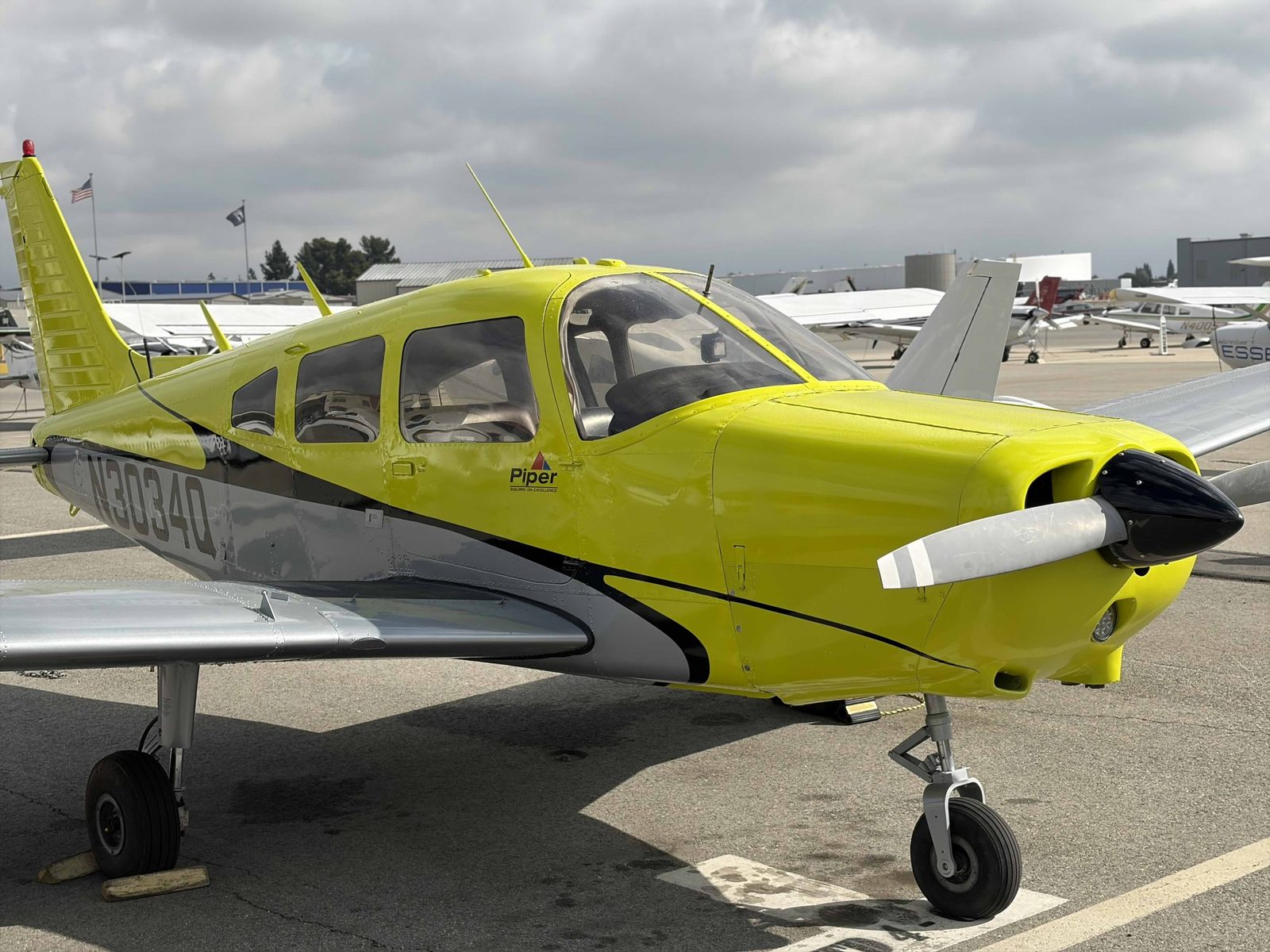 Piper Warrior N3034Q nose and cabin, close front quarter view on the ramp